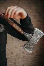 Double sided engraved axe